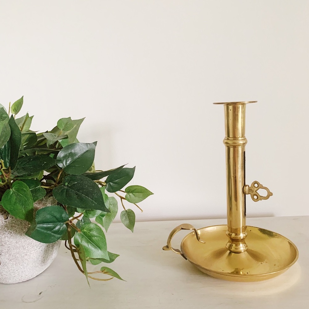 cute brass candle holder with key